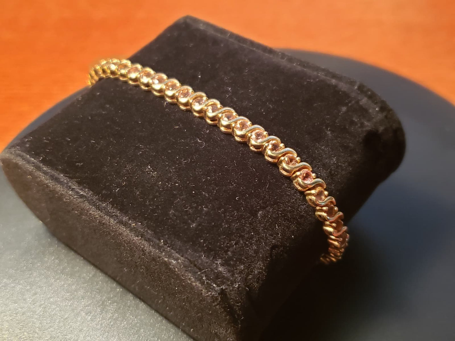 10 K STS  Pink Topaz Tennis Bracelet. 7.5"