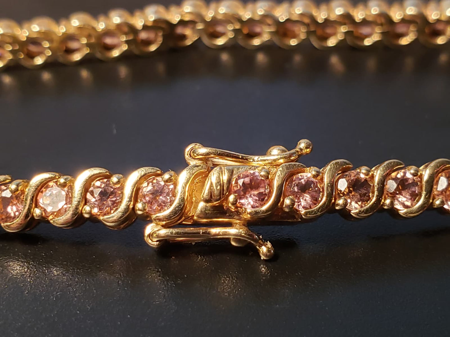 10 K STS  Pink Topaz Tennis Bracelet. 7.5"